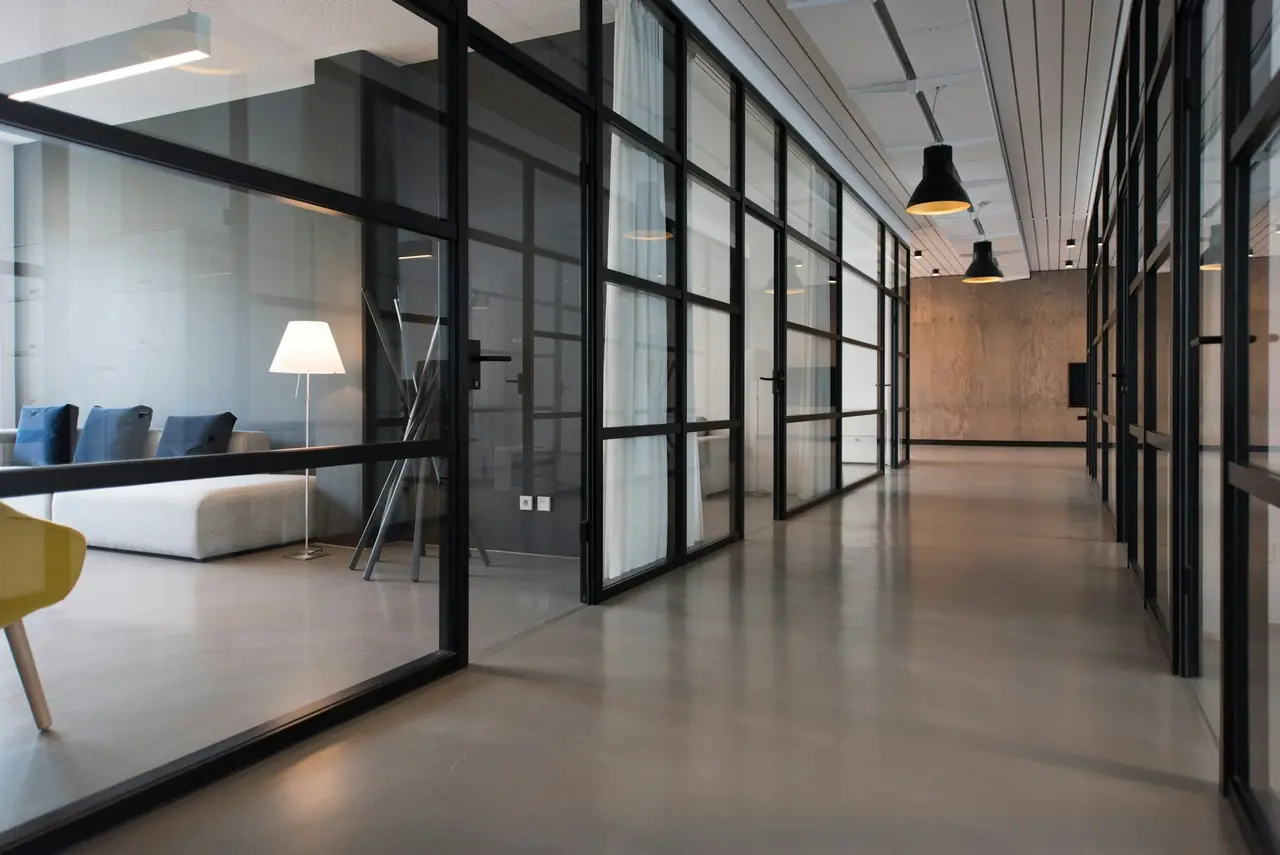 thoughtfully designed office interior with custom wood wall panels, built-ins and custom furniture.