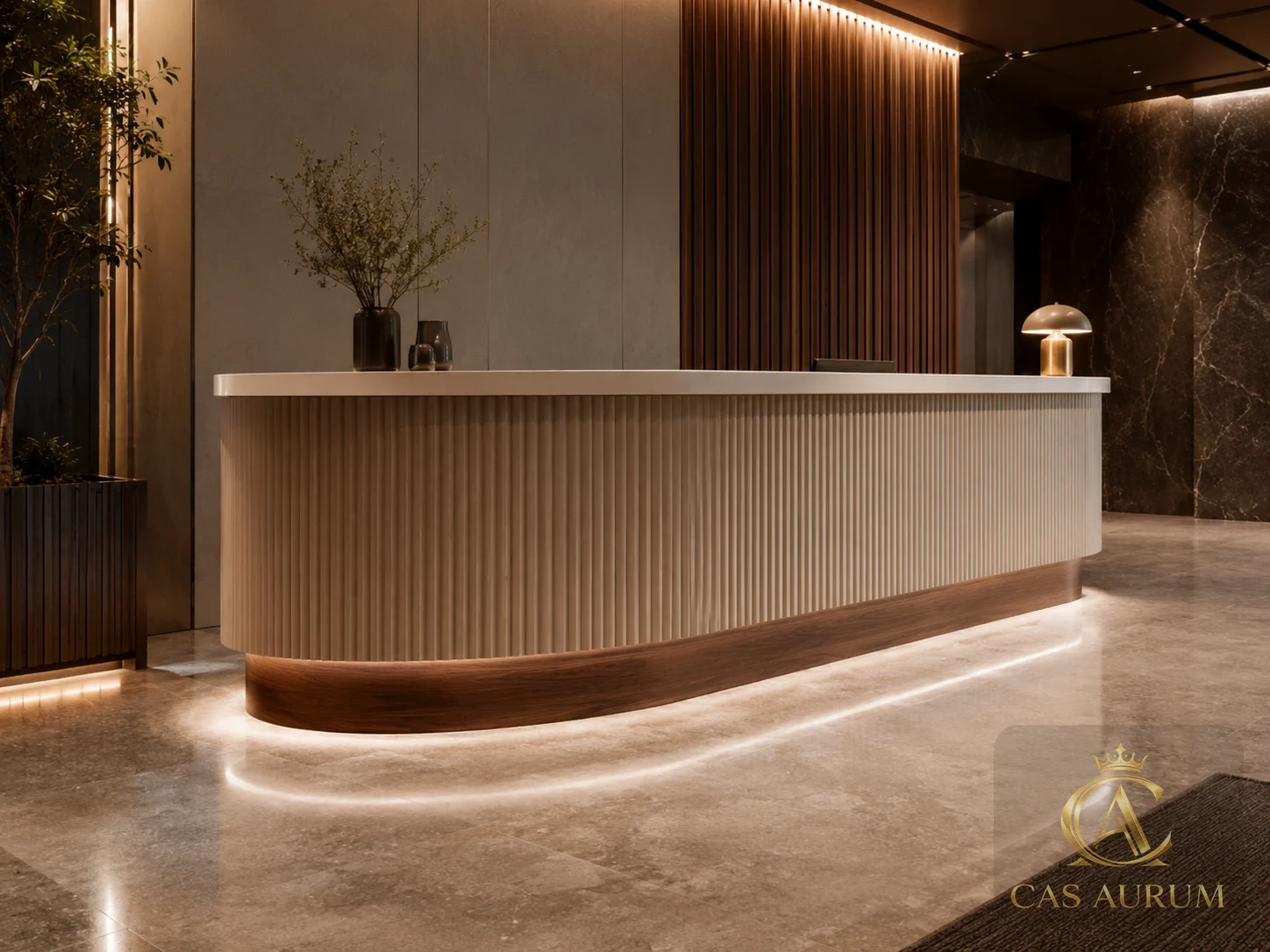 custom fluted reception desk with stone top, warm wood base, integrated lighting and refined commercial lobby millwork by CAS AURUM.