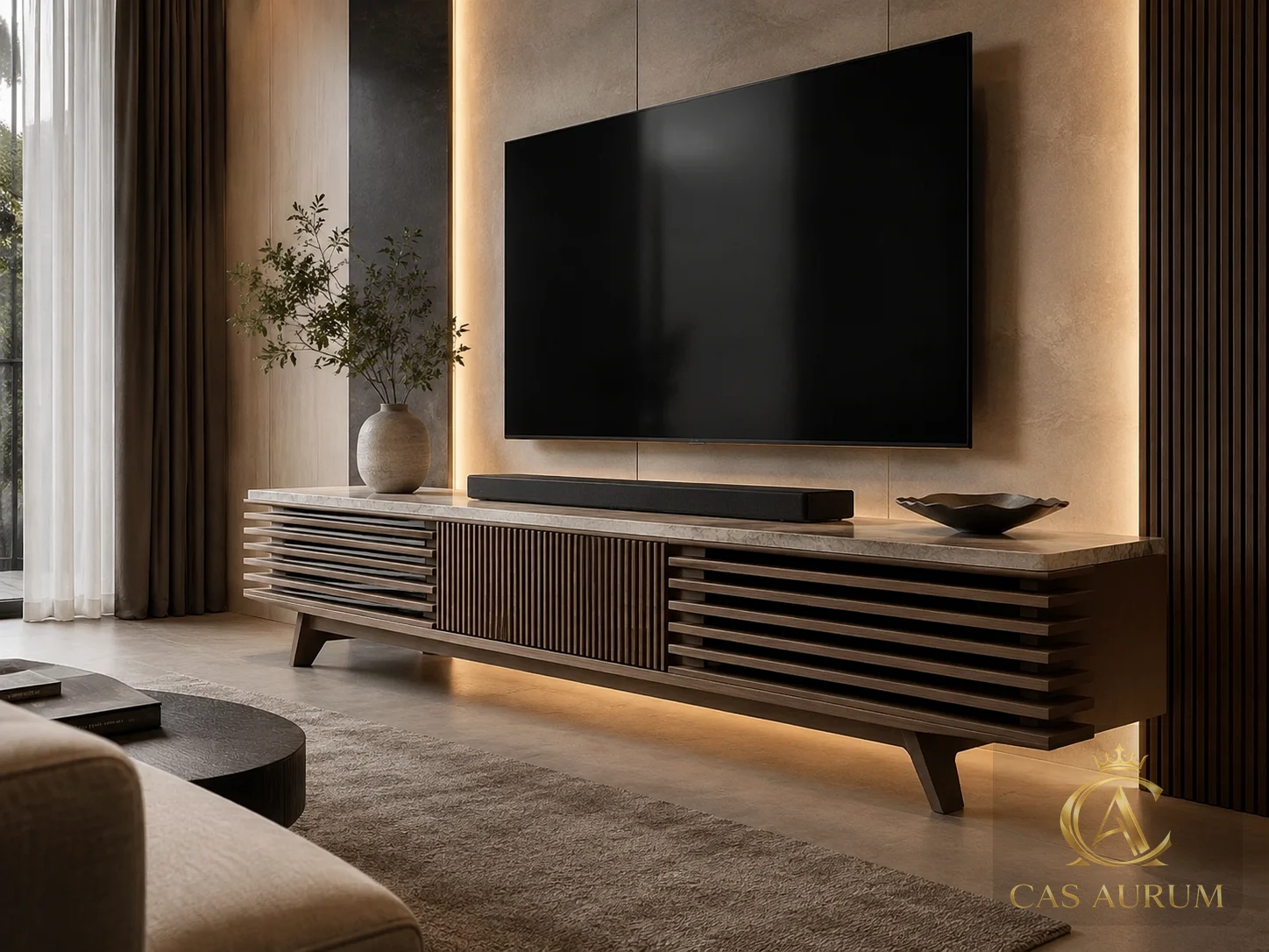 thoughtfully designed slatted wood media console with stone top, warm underlighting, TV wall and warm, tailored living room styling by CAS AURUM.
